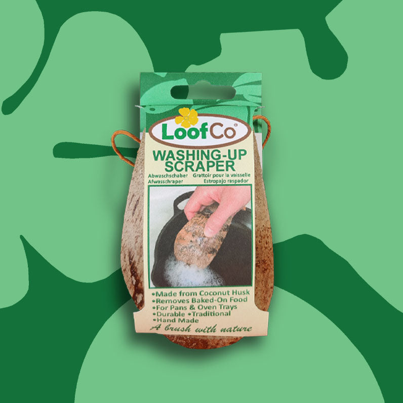 image of LoofCo coconut husk washing-Up scraper on green background with eco logos