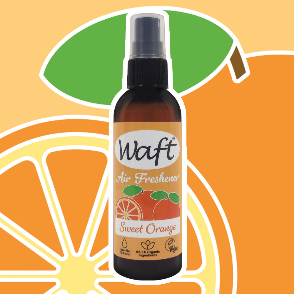 Waft Air Freshener Sweet Orange on an orange background