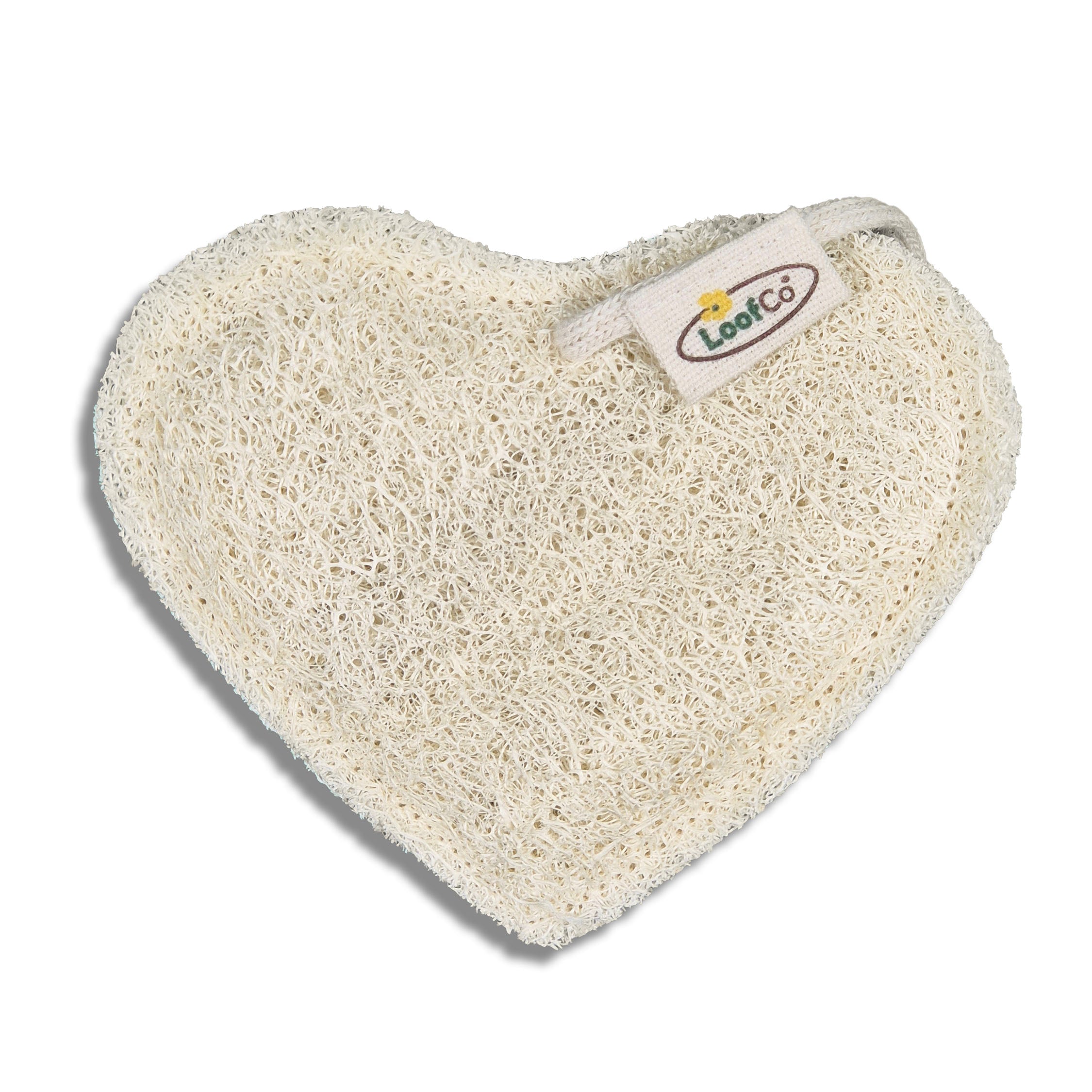 Heart-shaped natural sponge with LoofCo label on a white background
