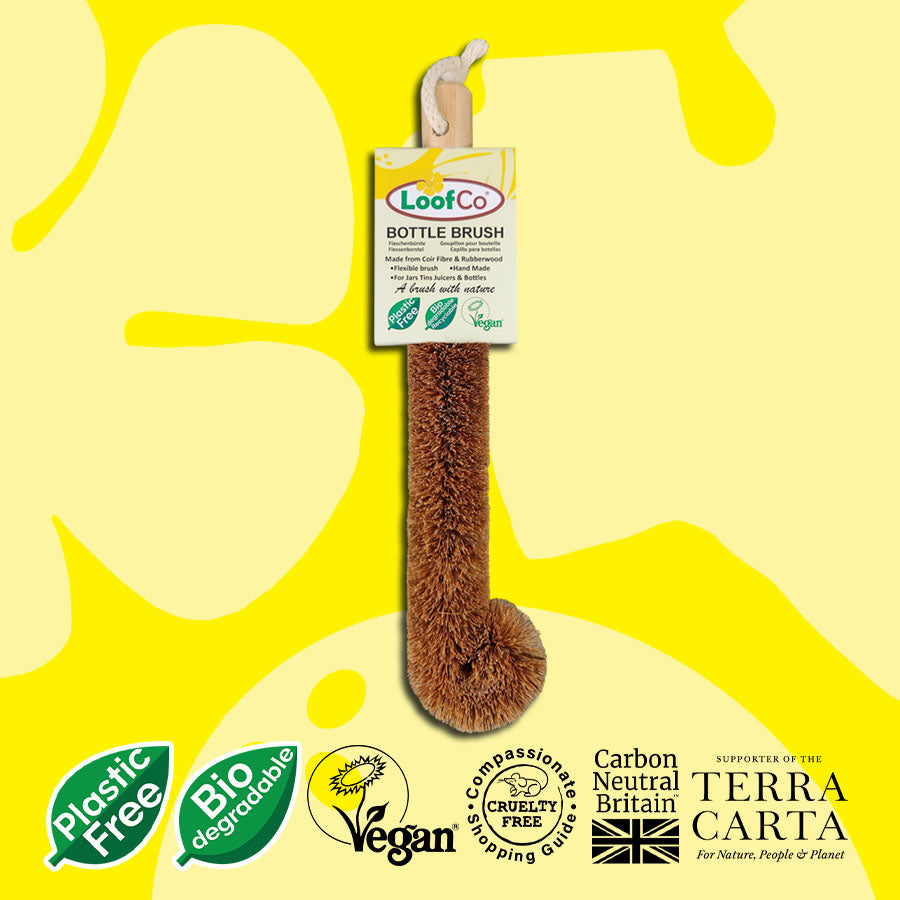 LoofCo Bottle Brush in packaging on yellow background with sustainability logos