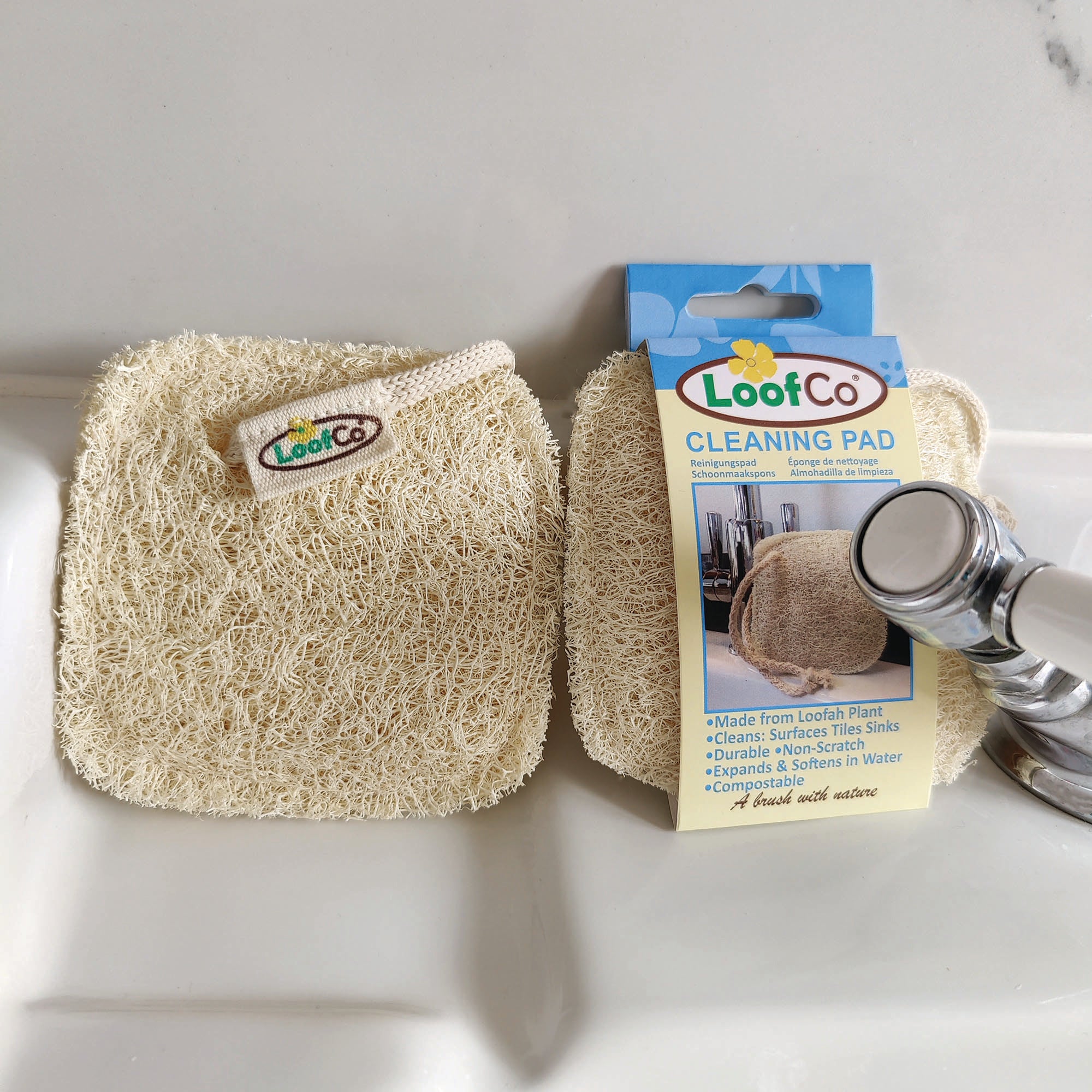 LoofCo cleaning pad with packaging on a white surface