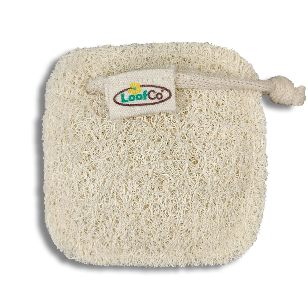 Natural loofah with a string loop and LoofCo logo on a white background