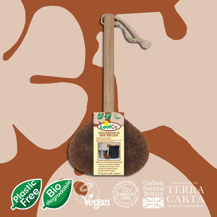 Loof Co household bin brush with packaging on a brown and beige abstract background, featuring sustainability logos