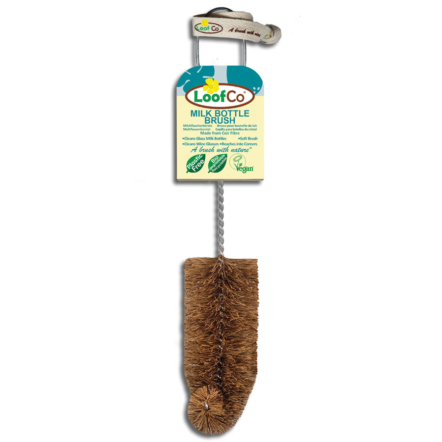LoofCo milk bottle brush with a label on a white background