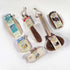 LoofCo bundle of Kitchen Cleaning brushes, pads and cloths with packaging on a white background