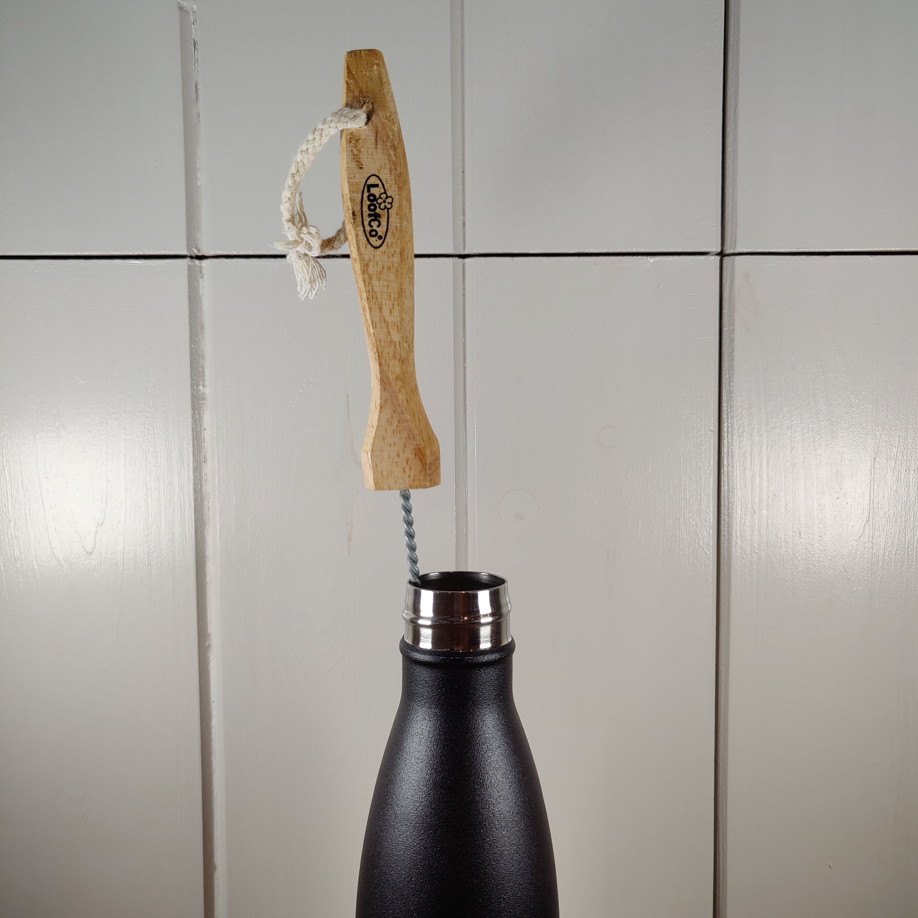 Image of LoofCo Water Bottle Brushes inserted into a typical sports water bottle